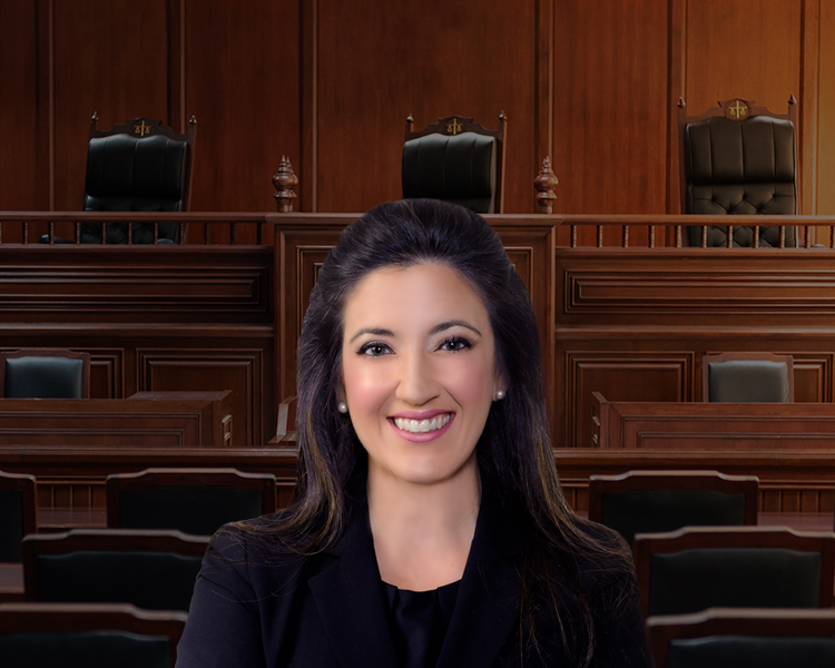 Profile photo of Ivette G. Petkovich with a court in the background.